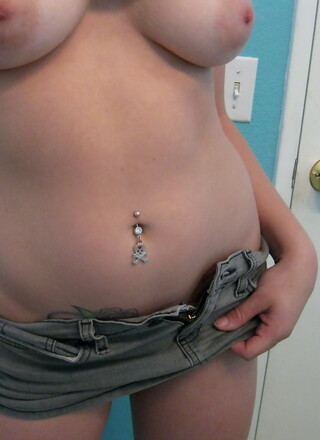 Busty girlfriend takes selfshot pictures in the mirror for her boyfriend