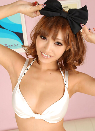 Asuka Kirara Asian with bow in hair shows big hooters in bras